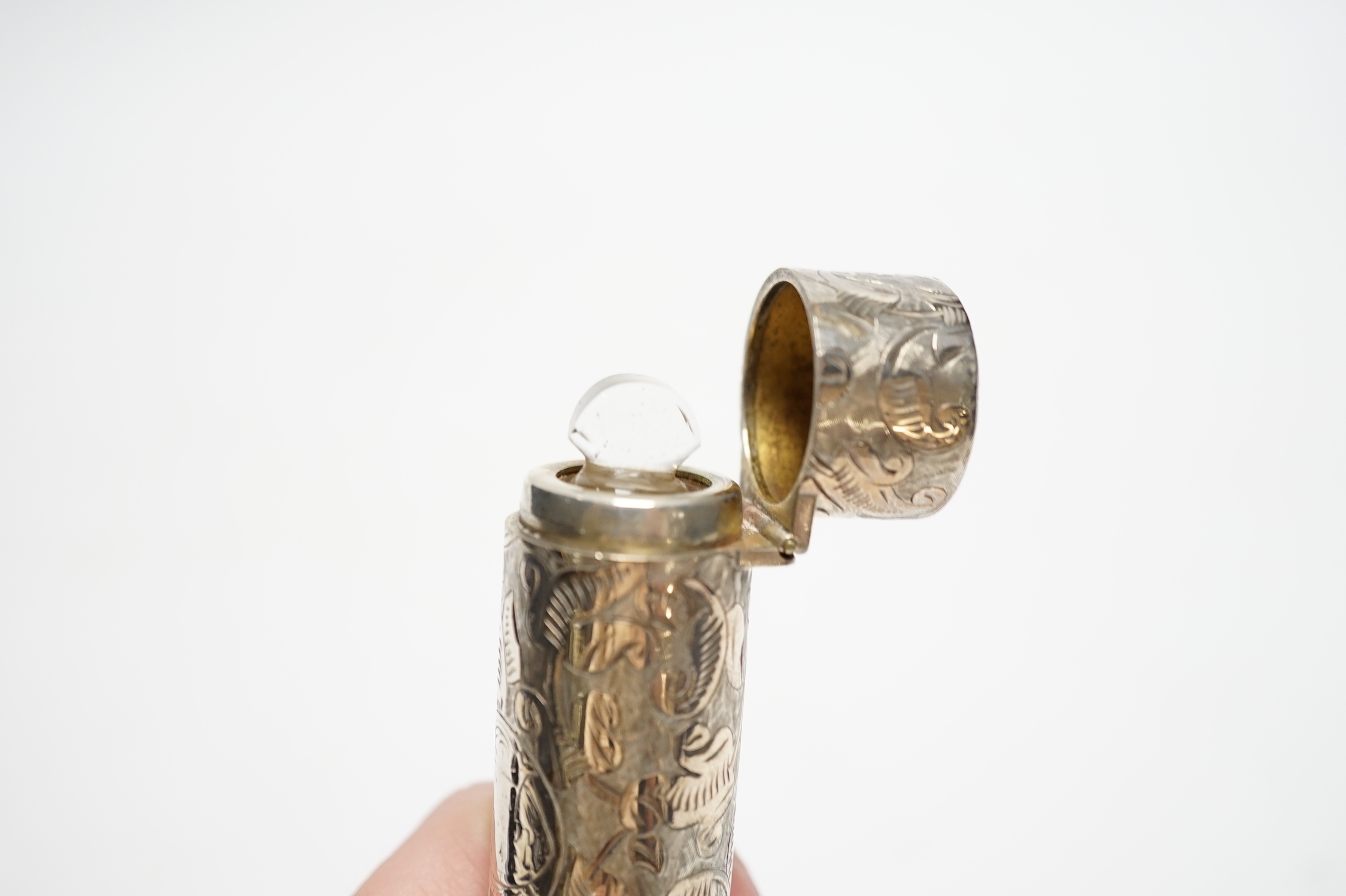 A late Victorian engraved silver double ended scent bottle, Frederick Bradford Macrea, London, 1889, 87mm.